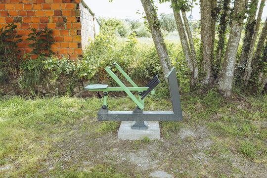 Rowing Machine (Rowing Simulator) - Outdoor Gym, Santa Comba D&atilde;o, Portugal, public fitness Calisthenics equipment in a green park environment