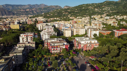 Fototapeta premium Aerial drone view of Sorrento coastline at sunset over