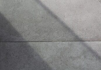 Fototapeta premium Abstract concrete surface with light and shadow play
