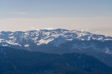 Fototapeta premium Mountains Snow Alps Winter Panoramic View: Majestic snow-capped Alps mountain range during winter, showcasing a breathtaking panoramic view.