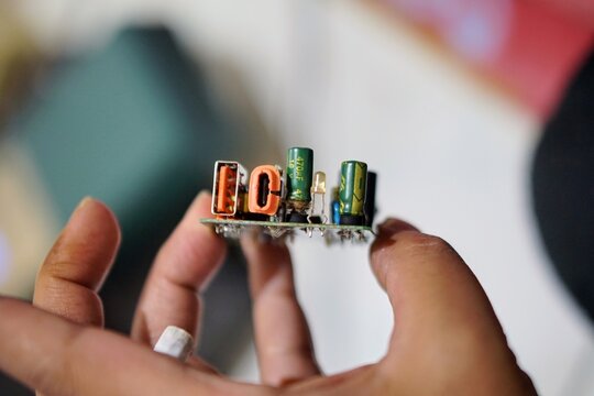 Mini fast charging electronic circuit board with USB-C connector and compact technology components design.