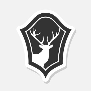 Deer Shield logo sticker isolated on gray background