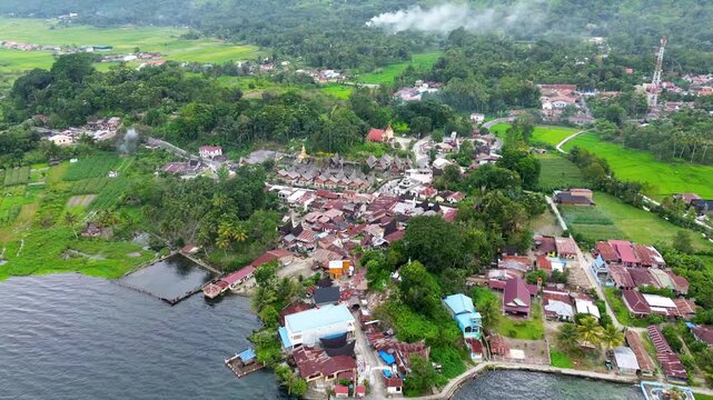 Drone Footage of Preserved Batak Toba Cultural Village on Samosir Island, Lake Toba, Indonesia &mdash; Traditional Rooftops from Above