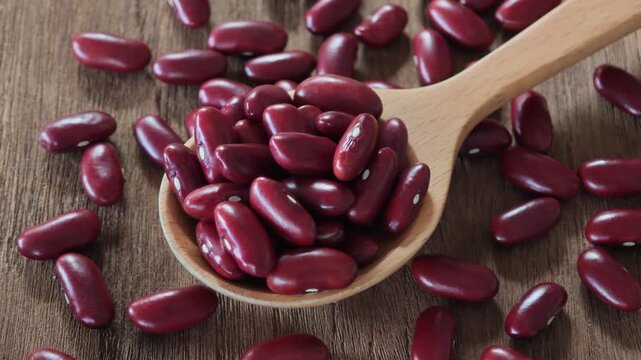  red beans in wooden spoon.