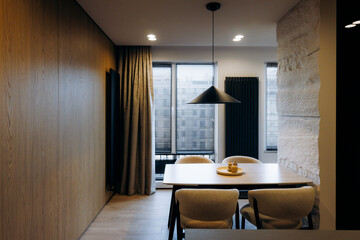 Charming meal area with view. Intimate eating space overlooking city © Kantemir Production