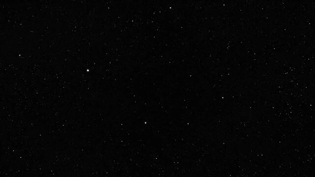 Epic time-lapse of a starry night sky with bright stars, clouds, and celestial bodies slowly changing over time