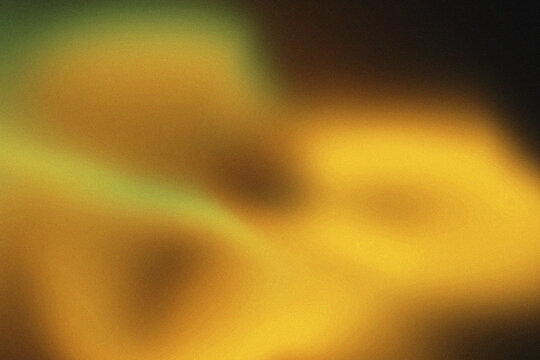 Abstract yellow and gold gradient background with soft blurred wave textures