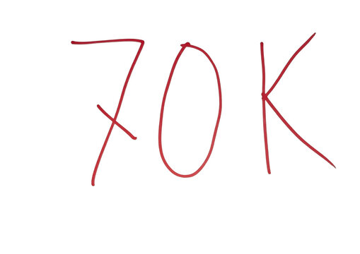 Handwritten 70k number in red chalk on grid paper