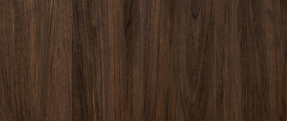 Naklejka premium Wood texture background shows a dark brown walnut timber surface with beautiful natural organic grains