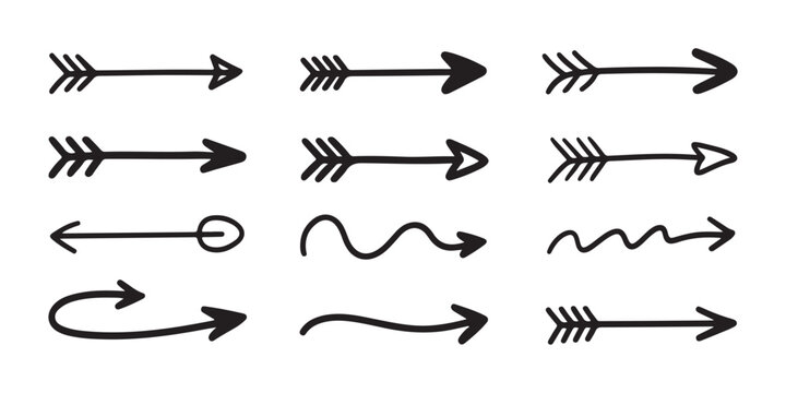 Collection of hand drawn arrow sketches with feathers and varying tips for artistic document annotation.