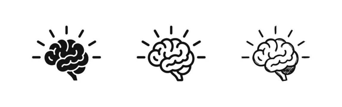 Human brain icons with light rays for creativity and ideas