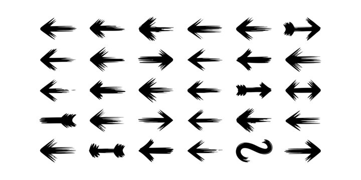 Set of hand drawn black ink brush arrows pointing in different directions for design elements and creative signs on a clean simple surface Vector, illustration