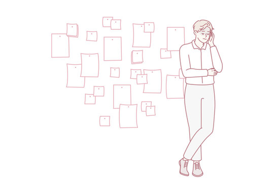 Young creative man project manager stands cross-legged and touches head thinking about future development of company. Startup employee guy posing near wall with stickers. Flat vector illustration