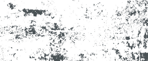 Fototapeta premium Dark gray grunge texture with distressed speckles on white background