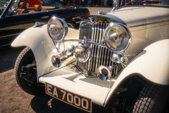 Berlin, Germany - May 2, 2026: Cream Classic Roadster Front Detail