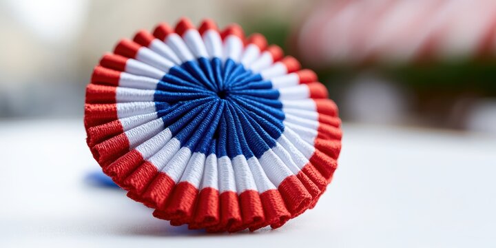 textile arts, a detailed close-up of a french tricolor cockade made of pleated silk ribbon against a white backdrop, with a blurred parisian street caf in the background