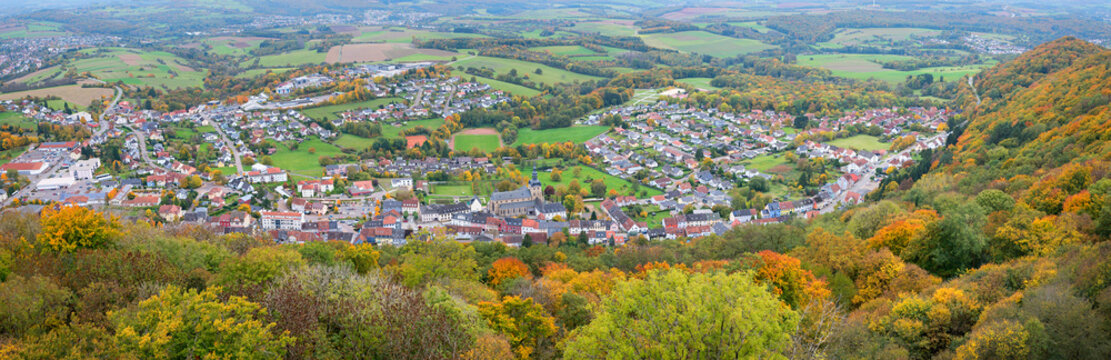 view from above to the town Tholey, Saarland, in autumn. tourist destination Schaumberg