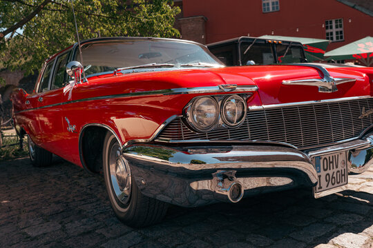 Berlin, Germany - May 2, 2026: Red Imperial Classic Car Close-Up