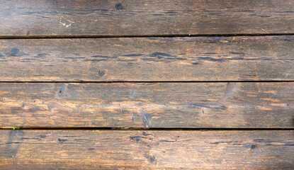 Fototapeta premium Old Wet Wooden Plank Floor Texture with Rustic Aged Boards, Photorealistic old wet wooden plank floor texture with rustic aged boards, natural wood grain, cracks, gaps and subtle outdoor debris. Ideal