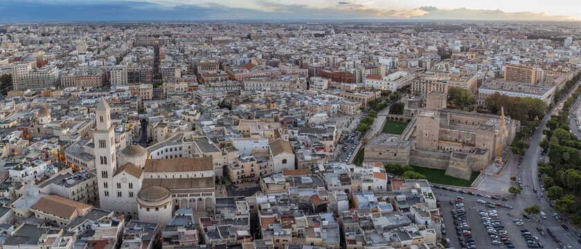 Bari, Italy Aerial View: Historic Old Town, Basilica Di San Nicola, And Swathes Of Urban Landscape At Sunset