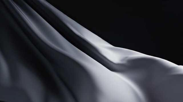 Ethereal gray fabric draping slowly in dark space with soft lighting and smooth movement