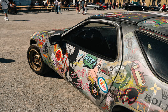 Berlin, Germany - May 2, 2026: Sticker-Covered Classic Car at Show