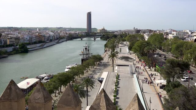 Seville Panoramic View from the Torre del Oro Tower overlooking the Guadalquivir River, River Promenade and Paseo de Crist&oacute;bal Col&oacute;n street.