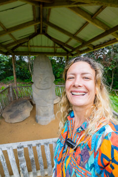 Smiling traveler at San Agustin Archaeological Park