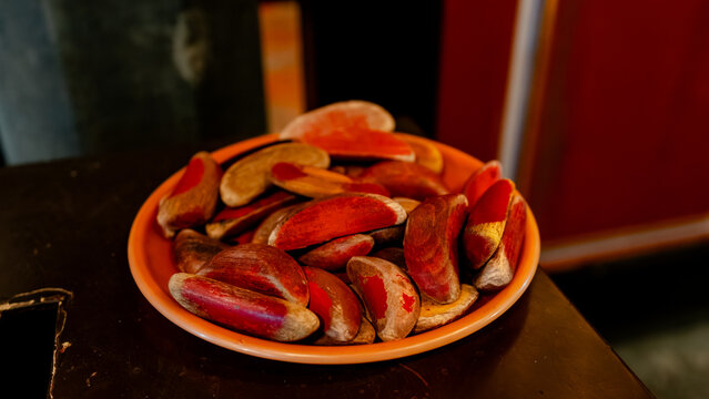 Traditional wooden Jiaobei blocks in orange dish