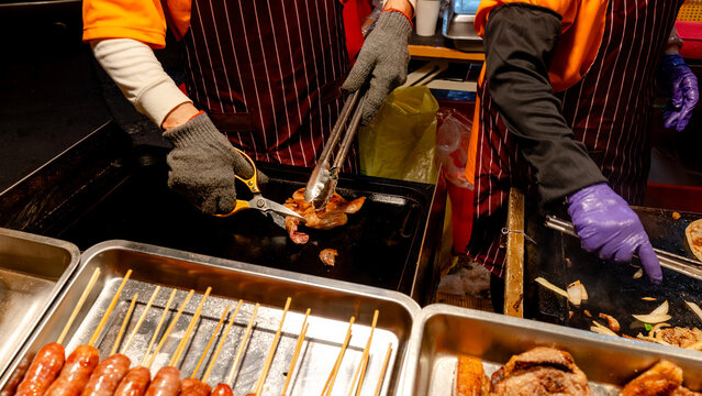 Street food preparation at a Taipei night market