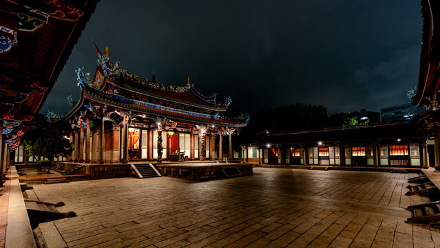 Confucius temple illuminated at night in Taipei