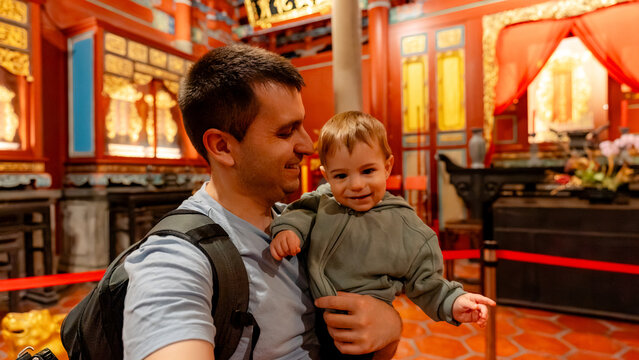 Father and child exploring Confucius Temple, Taipei