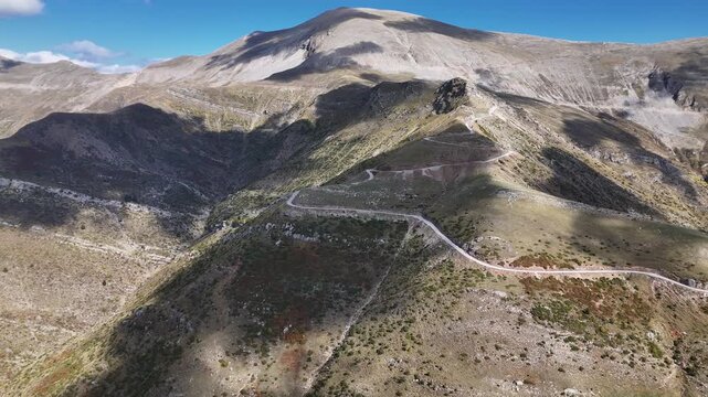 Mountain road winding across high plateau in Pindus range near Metsovo, northern Greece