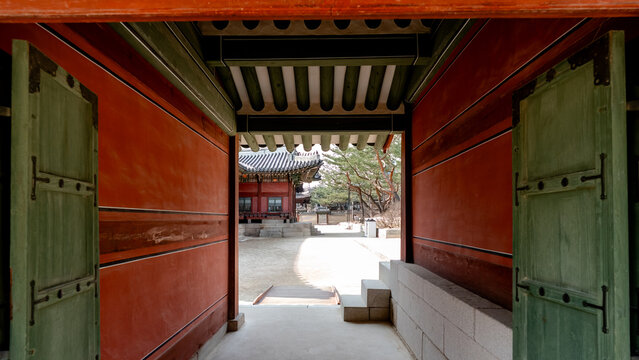 View through Deoksugung Palace gate into tranquil courtyard