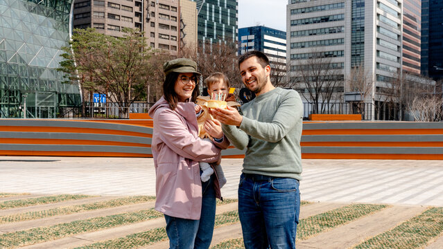 Family celebrates 11 month birthday at Seoul Plaza City Hall
