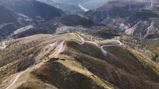 Winding road through deep mountain valleys in northern Greece, Pindus Mountains, Epirus
