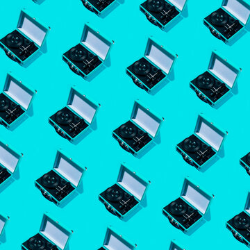 Seamless retro repetition pattern turntables on turquoise background