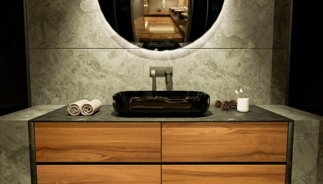 Modern luxury bathroom vanity with stone sink and mirror