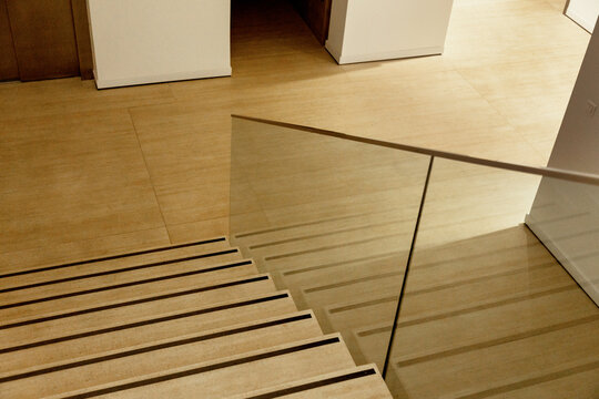 Staircase with glass railing in modern interior design