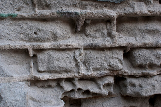 Closeup Detail of Aging Gray Brick Wall Texture