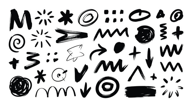 A collection of hand drawn doodle elements and abstract black ink shapes