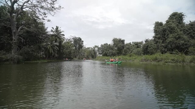 View of scenic boat safari on Hiriwadunna Wewa reservoir near Dambulla, Matale District, Sri Lanka, Asia