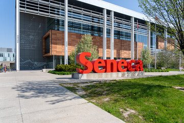 Fototapeta premium Toronto, Canada -May 18, 2026: Close up of Seneca sign at Seneca Polytechnic Newnham Campus in Toronto, Canada, in 2026. Seneca College of Applied Arts and Technology, branded as Seneca Polytechnic is
