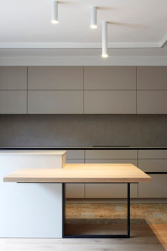 Minimal modern kitchen interior with island and pendant light
