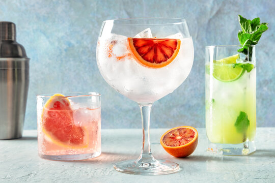 Refreshing summer cocktails with citrus fruits