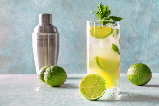 Refreshing summer Mojito cocktail with limes and mint