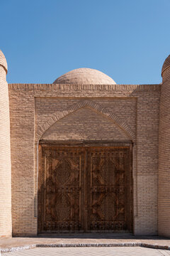 Ancient carved gate in Khiva Uzbekistan Silk Road city