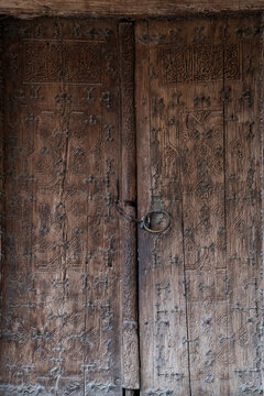 Ancient carved wooden door detail in Khiva old town