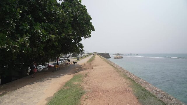 Elevated view from city wall of ocean and Galle Fort on a sunny day, Galle Dutch Fort, Galle, Southern Province, Sri Lanka, Asia