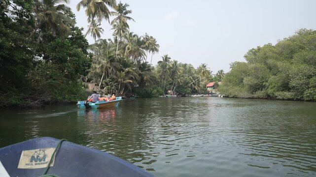 On board boat view of tourists on river safari, Madu River, Balapitiya, Sri Lanka, Asia